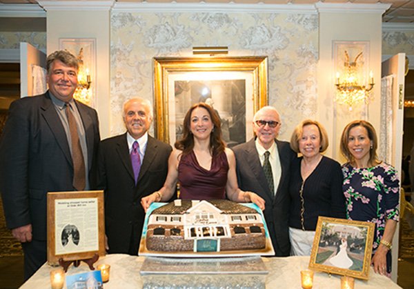 Members of the Bocina Group at their 20th anniversary celebration back in 2014. From left to right: Rich Crepeau (partner), Bruce Bocina, Brenda Curnin, Casper Bocina, Phyllis Bocina, Barbara Curtin Credit: The Olde Mill Inn archives