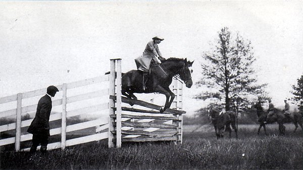  Mrs. Kenneth Schley is seen here jumping the gate in the early 1900s. 