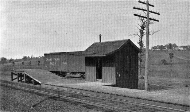 Bernardsville, This postcard depicts the DL&W Lackawanna Railroad Station in Mine Brook, circa 1905 very near Whitenack Road. The sign over the doorway reads “Mine Brook” and the boxcar is labeled “Grand Trunk 5502”. Isn't it amazing how few trees were on the hillside? I also recently learned why they called it Mine Brook since there were ore mines on the top of Bernardsville Mountain, earlier referred to as Mine Mountain. Just completed a research project of the Bishop Janes, who built his home near the mine. The ramp was established to make it easier for the patrons to get on and off the train. IF you travel east it would be left, and west would be right.