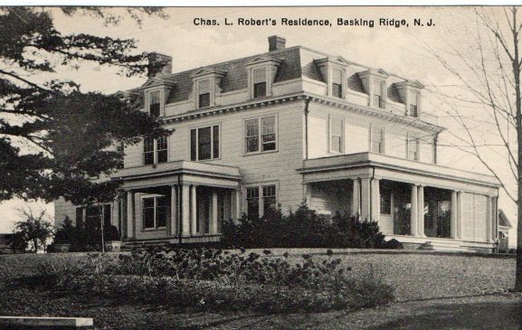 The Orchard Farm c. 1910 was built around 1870 at the corner of Madisonville Road and North Maple Avenue in the Madisonville section of Bernards Township. This was the largest Second Empire style house in Basking Ridge. For 40 years the Charles Roberts family lived there. Mr. Roberts was a prominent banker and the secretary/treasurer of the Childs Restaurant chain.