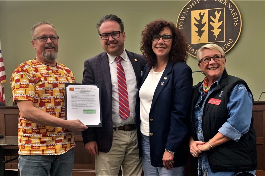 Members of the non-profit Mr. Local History Project are presented a township resolution by the entire Township Committee and Mayor Andrew McNally
